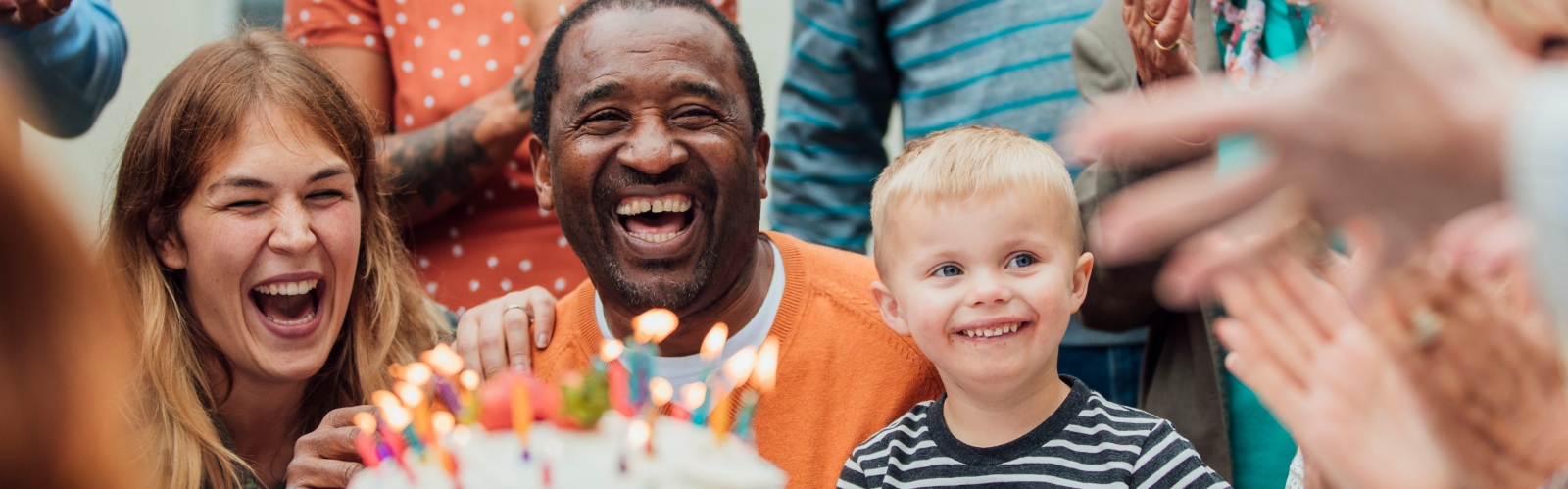 A family celebrate a birthday together