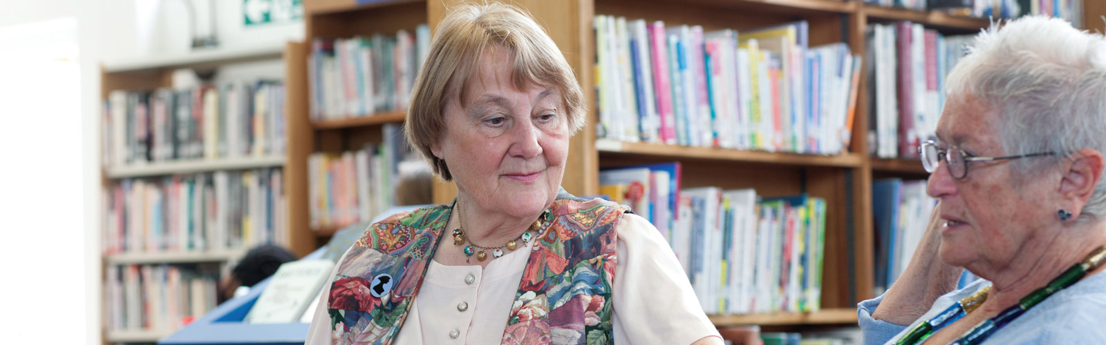 Two women in library