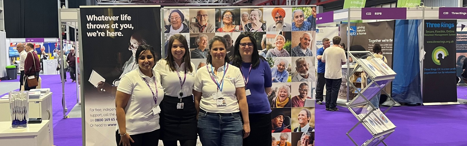 Age UK staff stood together