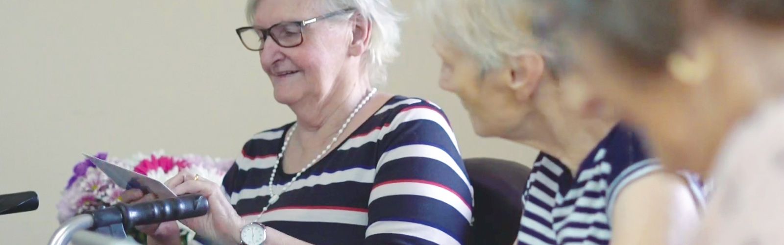 Women reading postcards