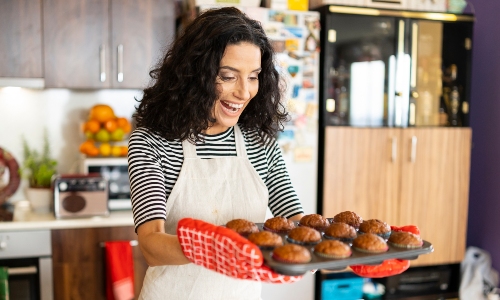 A woman baking in her kitchen