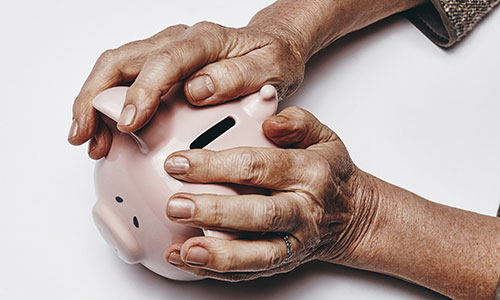 Hands on piggybank